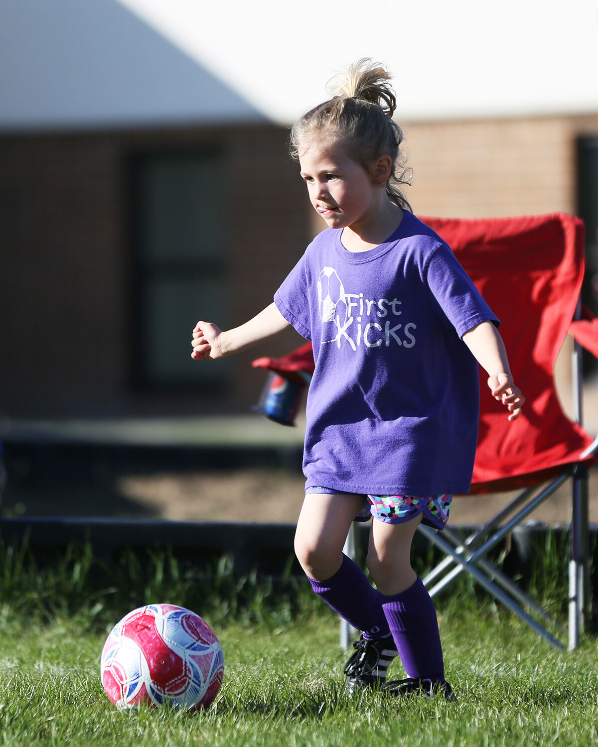 Allison Keown dribbles the ball downfield during her game
